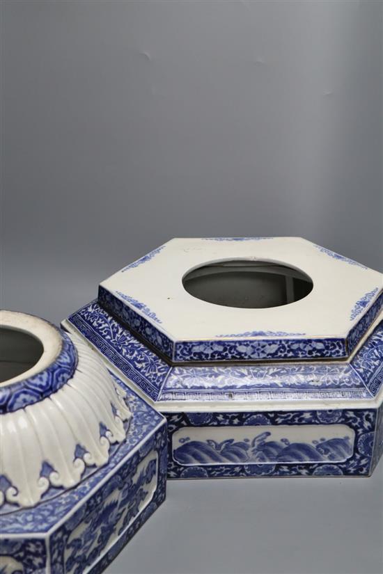 Two Japanese blue and white Arita porcelain hexagonal plinth bases, c.1900, largest 41cm wide